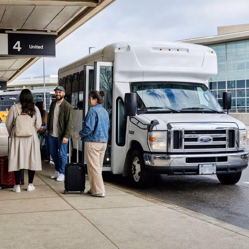 Black Mercedes Sprinter van staged for an Union Airport Transportation group