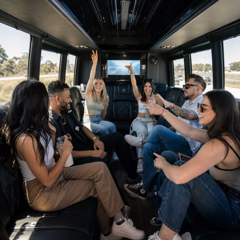 Group boarding a white charter bus for Concert Transportation transportation in Union