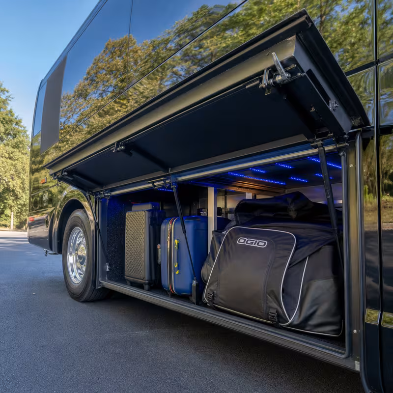 Party bus interior with wraparound leather seating and LED lighting in Union
