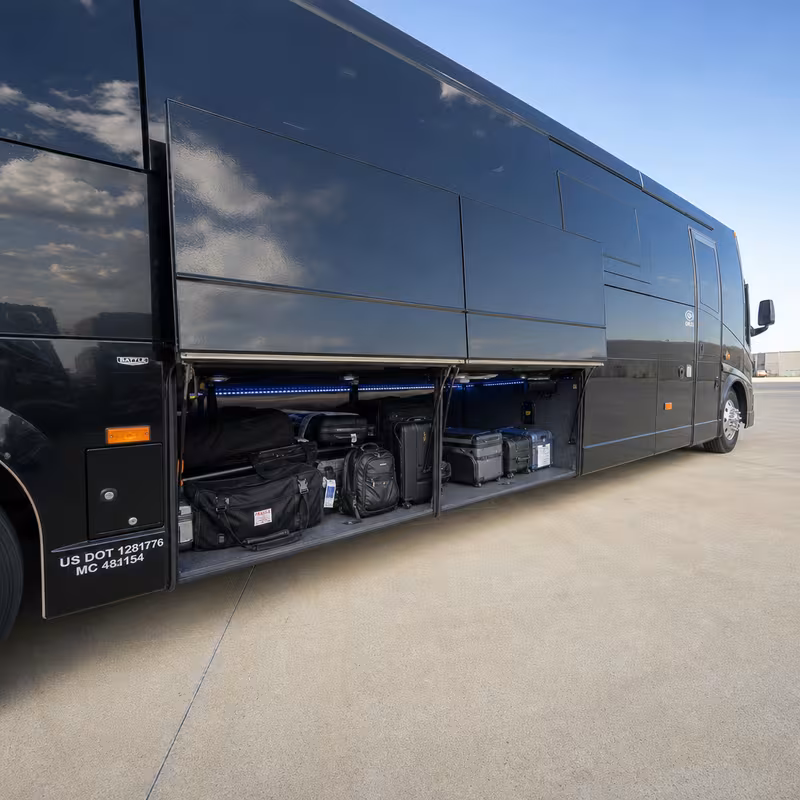 Party bus interior with wraparound leather seating and LED lighting in Union