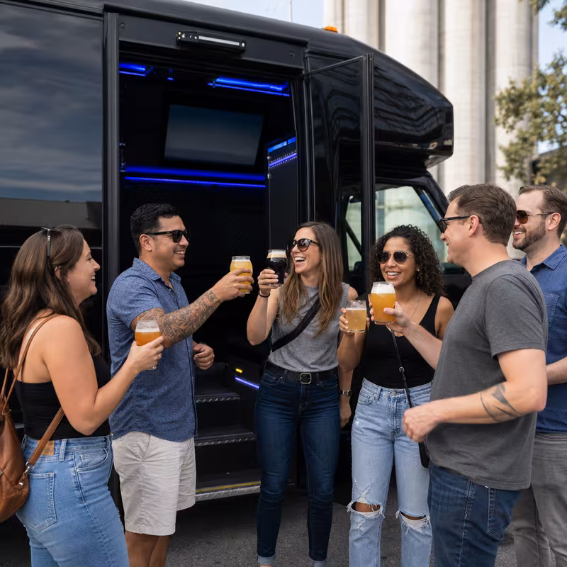 Passengers loading luggage while boarding an Union group shuttle